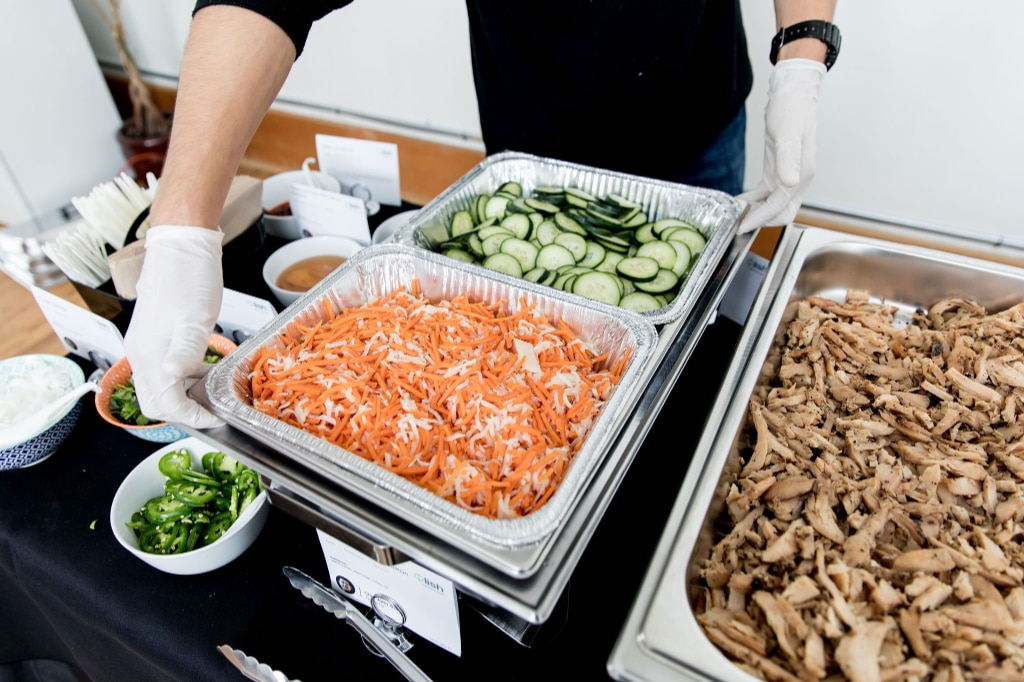 Professional caterers provide full setup, including chafing dishes to keep food warm